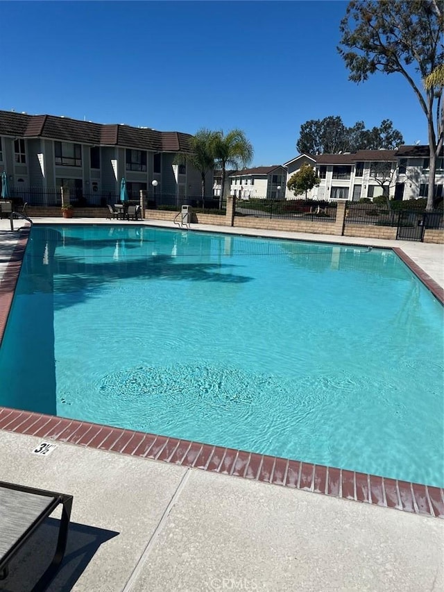 25885 Trabuco Rd Unit 271, Lake Forest, CA 92630 - community pool featuring a residential view