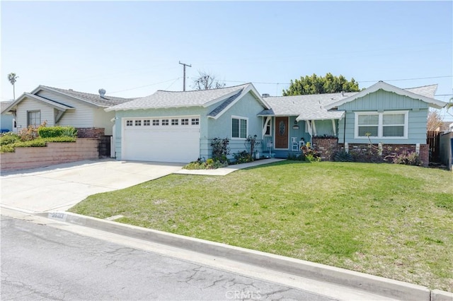 ranch-style house with a garage, a front yard, concrete driveway, and board and batten siding