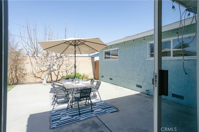 view of patio with outdoor dining space