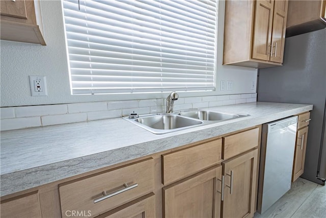 33112 Haddock St, Winchester, CA 92596 - kitchen featuring light brown cabinets, light countertops, a sink, light wood finished floors, and dishwasher