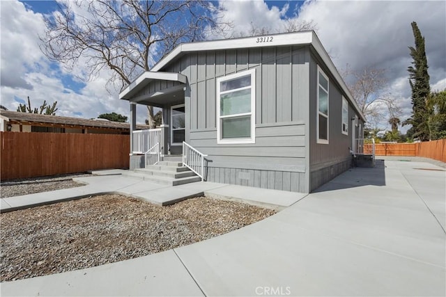 view of front of house with fence