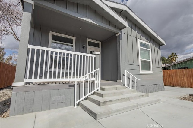 33112 Haddock St, Winchester, CA 92596 - doorway to property featuring fence and covered porch