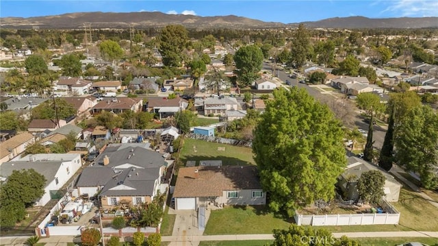 birds eye view of property featuring a residential view and a mountain view