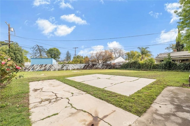 view of yard featuring a patio area and a fenced backyard