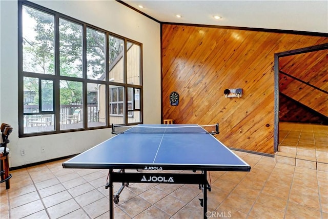 recreation room featuring recessed lighting, tile patterned flooring, and wooden walls