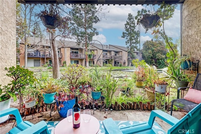 view of patio / terrace with a residential view