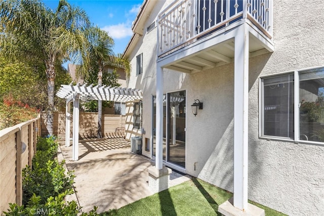 27139 Saddlepeak Trl, Valencia, CA 91354 - view of patio with a pergola, a balcony, and a fenced backyard