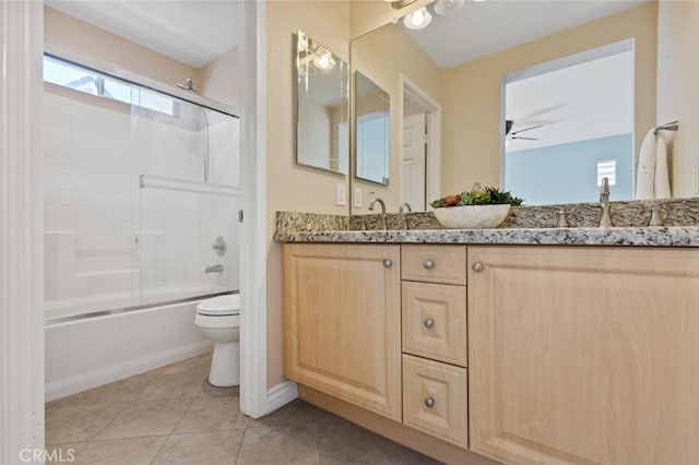 27139 Saddlepeak Trl, Valencia, CA 91354 - bathroom featuring a ceiling fan, tile patterned flooring, toilet, a sink, and double vanity