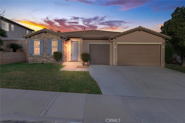 single story home featuring stucco siding, a garage, stone siding, driveway, and a front lawn