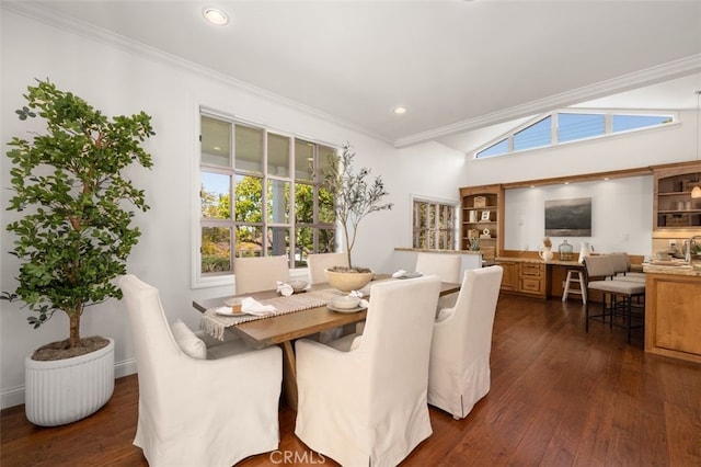 dining room with recessed lighting, dark wood-type flooring, and ornamental molding