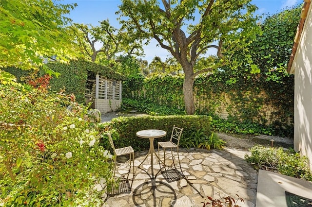 view of patio with fence