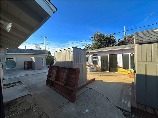 view of patio with an outdoor structure