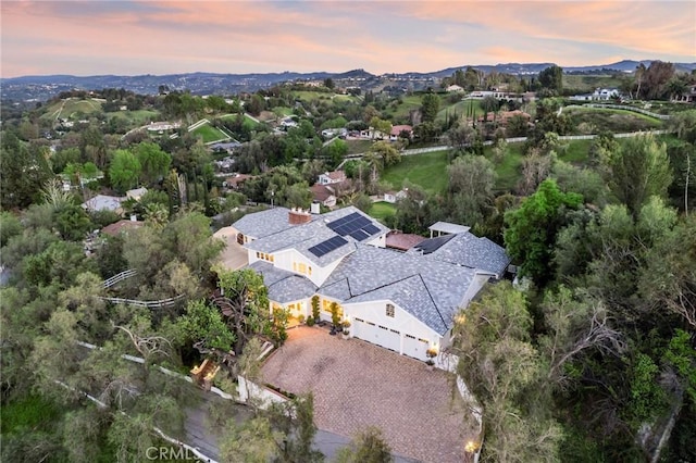 aerial view at dusk with a mountain view