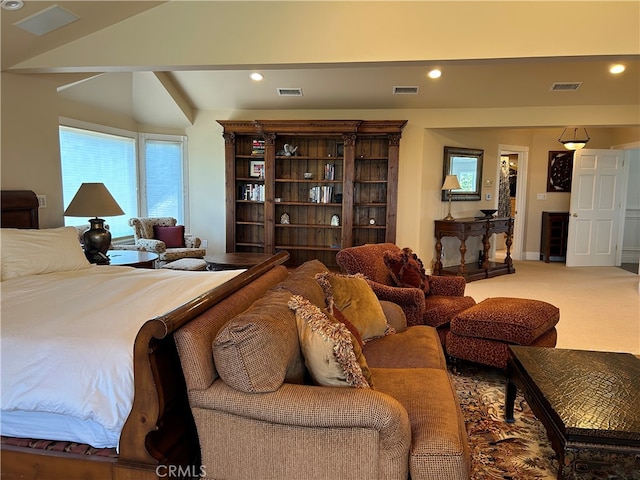 carpeted bedroom with lofted ceiling, visible vents, and recessed lighting