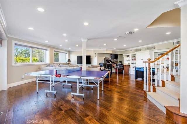 playroom featuring visible vents, ornamental molding, dark wood-type flooring, and recessed lighting