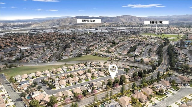 birds eye view of property featuring a residential view and a mountain view