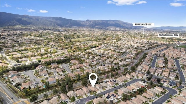 aerial view with a residential view and a mountain view