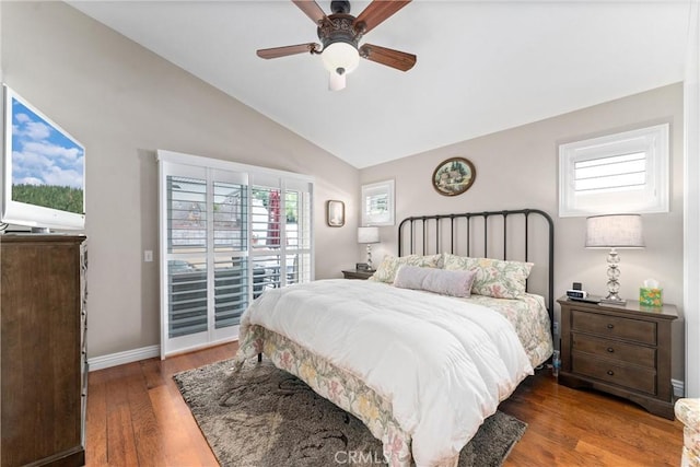 bedroom featuring ceiling fan, wood finished floors, baseboards, vaulted ceiling, and access to outside