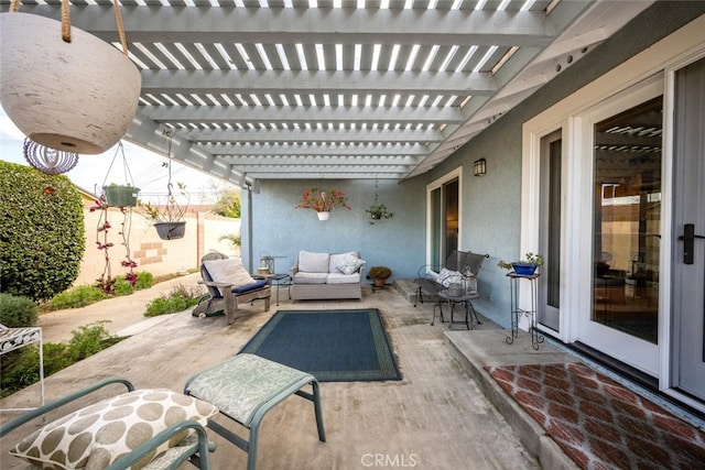 view of patio featuring fence, an outdoor living space, and a pergola