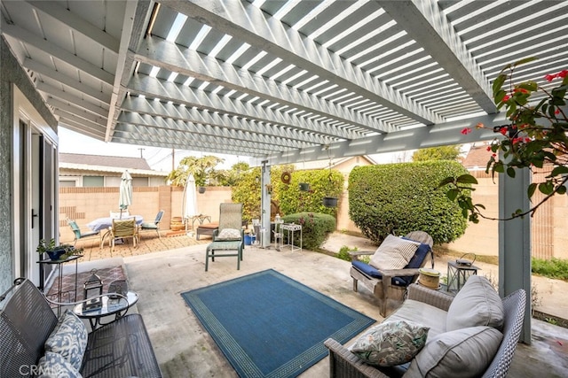 view of patio with a fenced backyard, an outdoor hangout area, and outdoor dining space