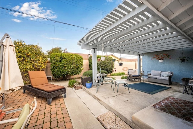 view of patio / terrace featuring a fenced backyard, outdoor lounge area, and a pergola