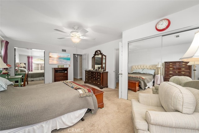 bedroom featuring ceiling fan, a closet, carpet, and visible vents