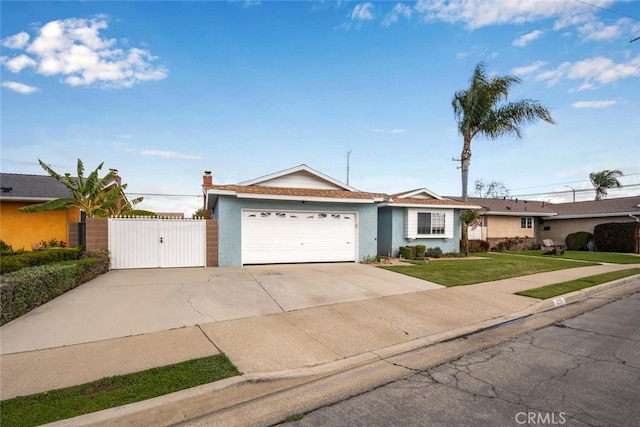 ranch-style home featuring a garage, concrete driveway, a gate, a front lawn, and stucco siding