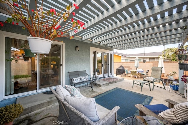 view of patio with fence and an outdoor living space