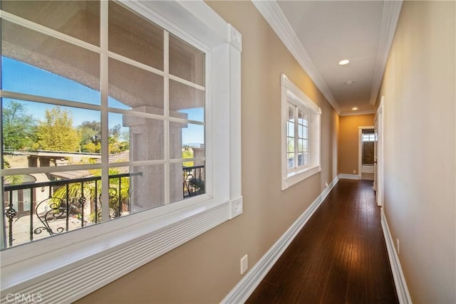 hall featuring recessed lighting, baseboards, dark wood-style floors, and ornamental molding