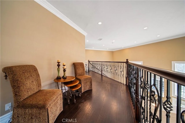 sitting room featuring crown molding, recessed lighting, and wood finished floors