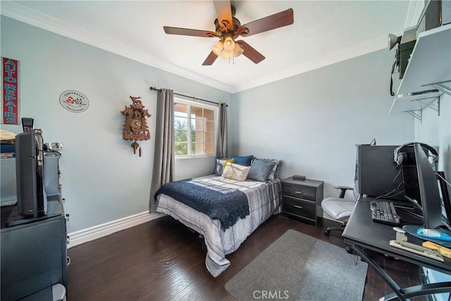 bedroom with baseboards, a ceiling fan, wood finished floors, and crown molding