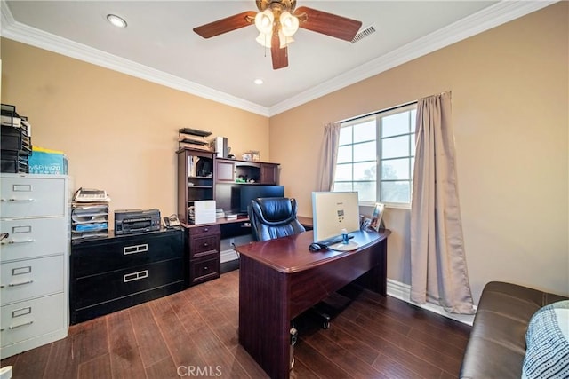 office area with visible vents, ornamental molding, a ceiling fan, dark wood-style floors, and baseboards