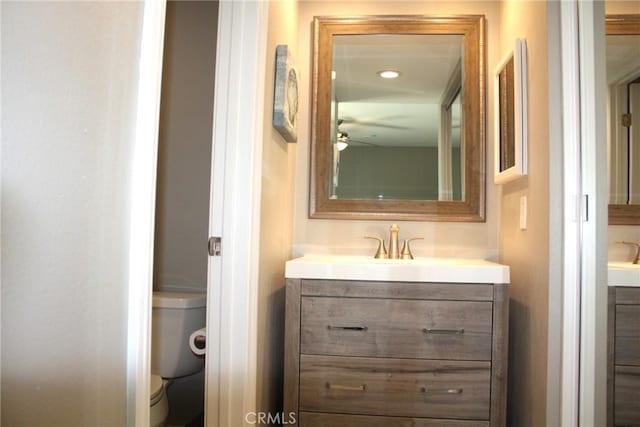 bathroom with vanity and toilet