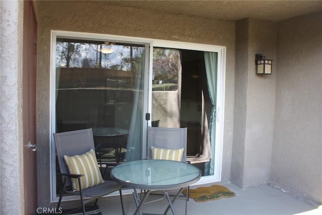 exterior space featuring stucco siding