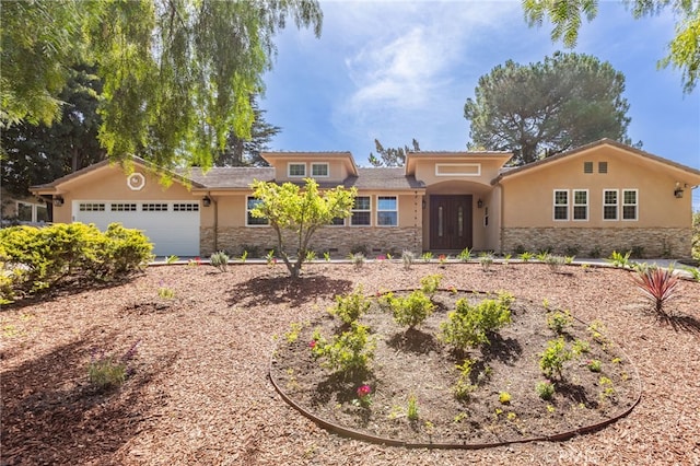 4 Singletree Ln, Rolling Hills Estates, CA 90274 - view of front of home featuring stone siding, stucco siding, and a garage
