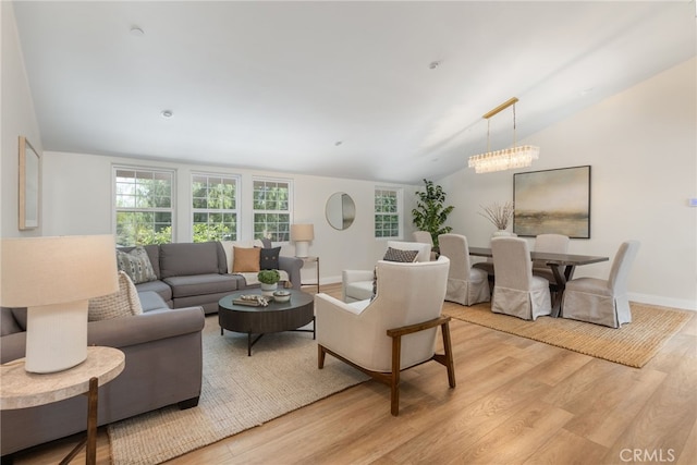 4 Singletree Ln, Rolling Hills Estates, CA 90274 - living room featuring lofted ceiling, light wood-style floors, and baseboards