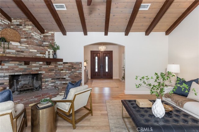 4 Singletree Ln, Rolling Hills Estates, CA 90274 - living area with arched walkways, wooden ceiling, light wood-type flooring, and baseboards