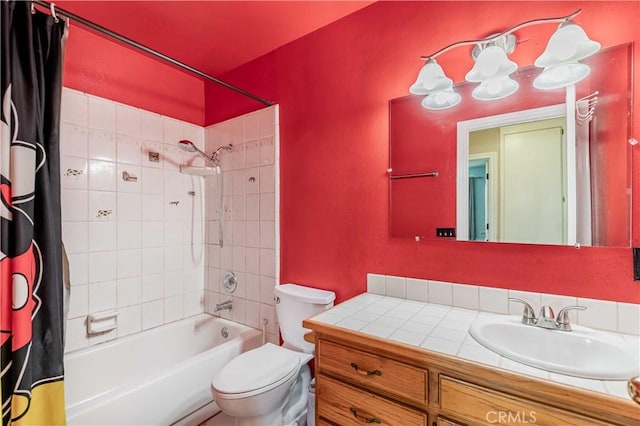 full bathroom with toilet, shower / bath combo with shower curtain, and vanity