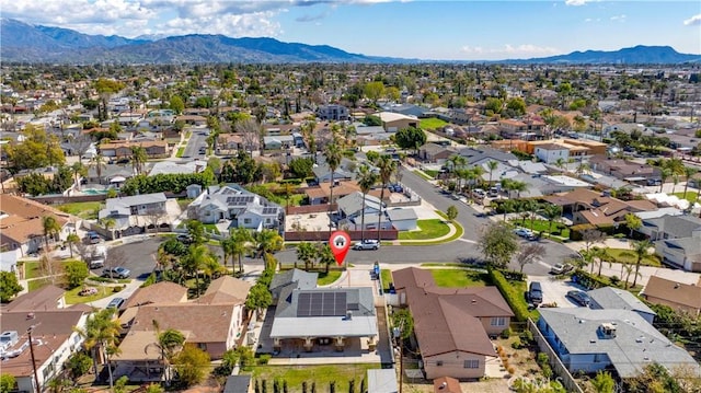 aerial view featuring a residential view and a mountain view