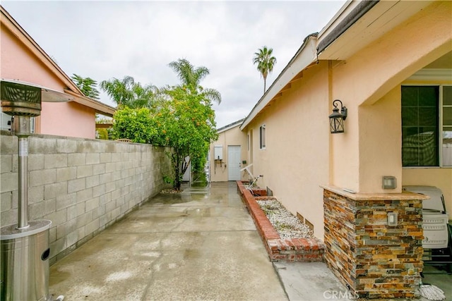 view of patio with fence