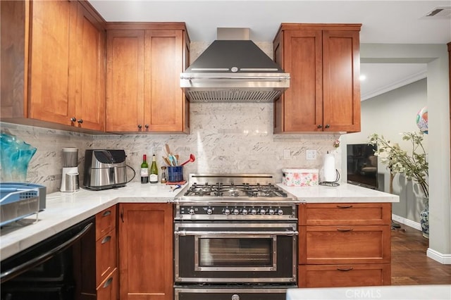 kitchen featuring visible vents, decorative backsplash, wall chimney exhaust hood, wine cooler, and double oven range