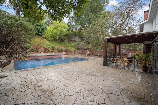 outdoor pool with a patio