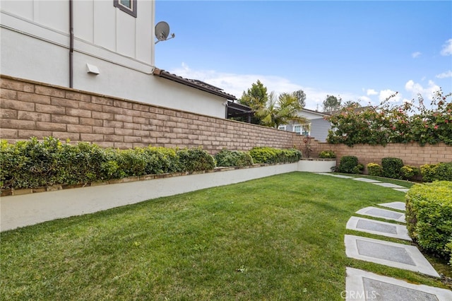 view of yard featuring fence