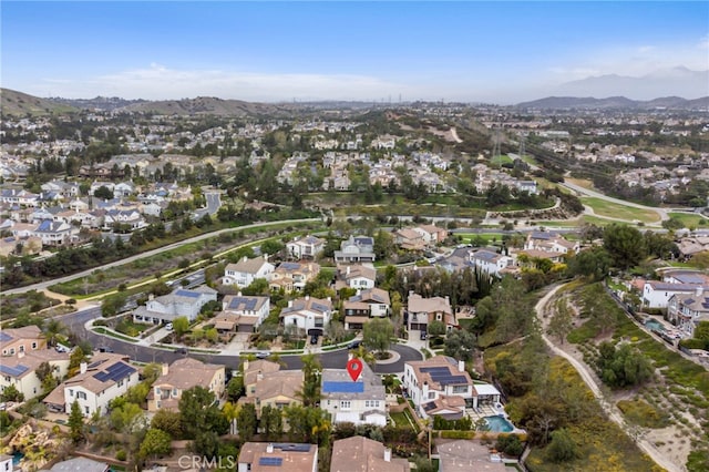 bird's eye view featuring a residential view and a mountain view