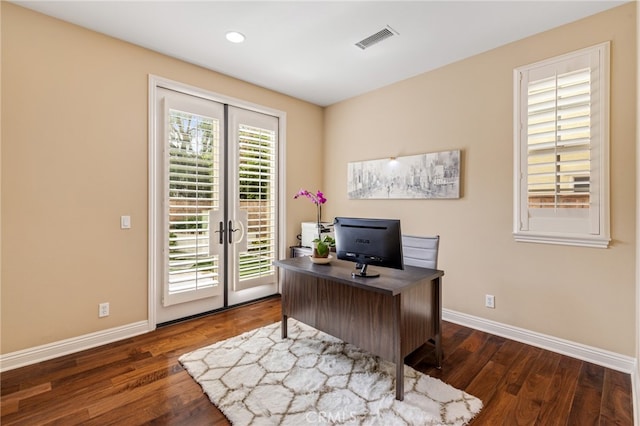 office space with baseboards, visible vents, dark wood-type flooring, and recessed lighting