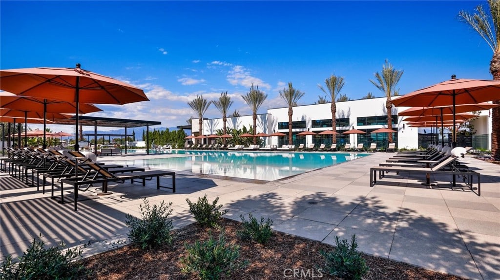 community pool with a patio