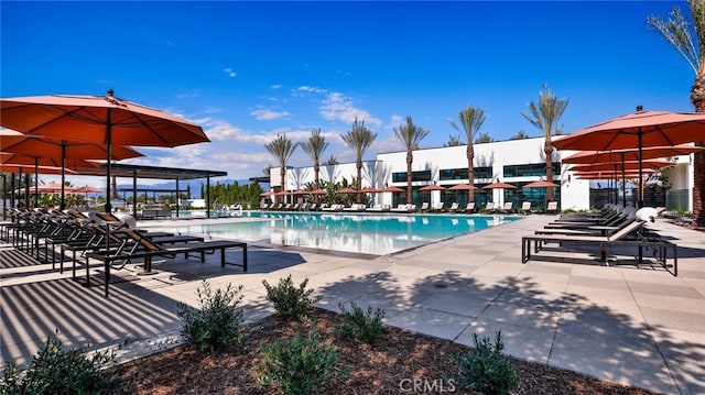 community pool with a patio