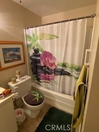 full bathroom featuring vanity, toilet, and shower / bathtub combination with curtain