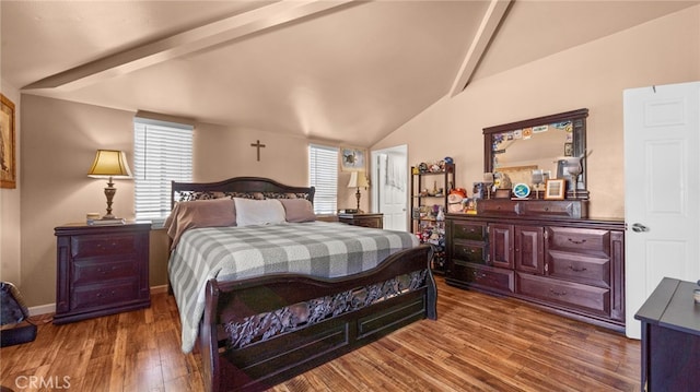 bedroom featuring lofted ceiling with beams, baseboards, and wood finished floors