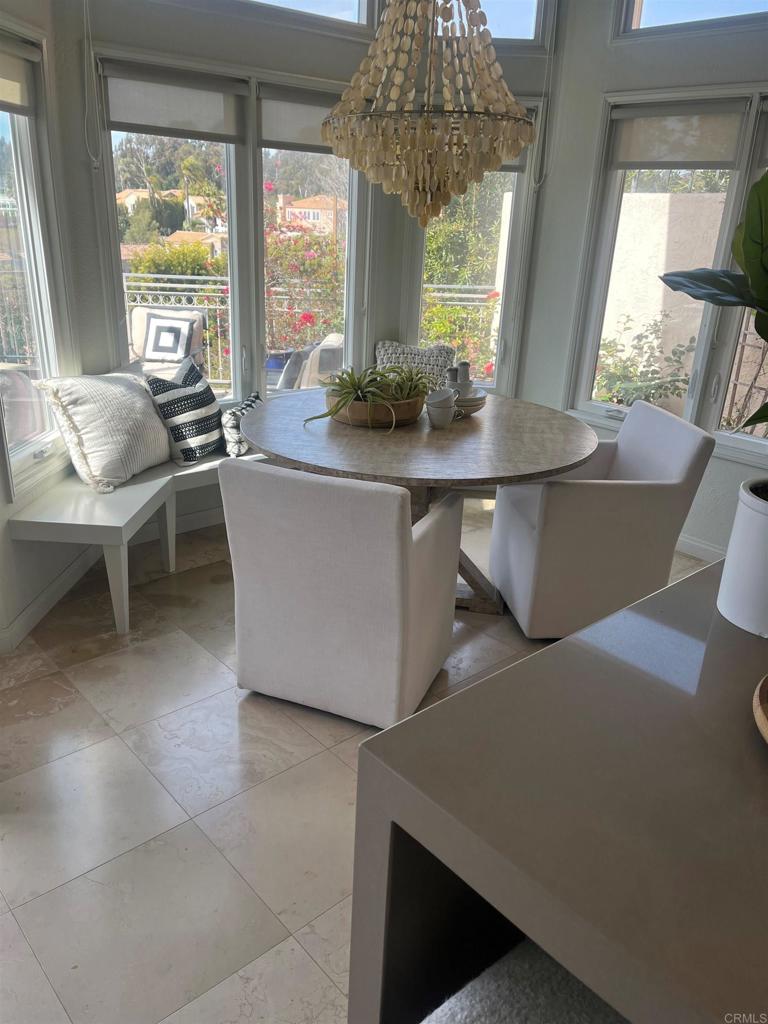 dining space featuring a chandelier